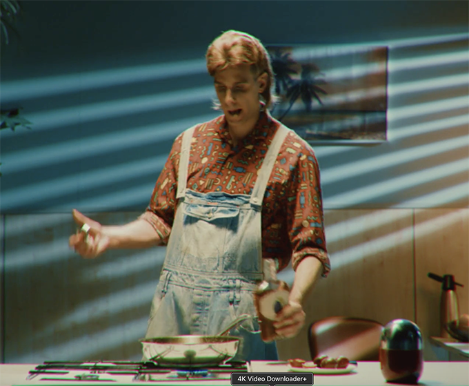 A man is cooking in 80s
